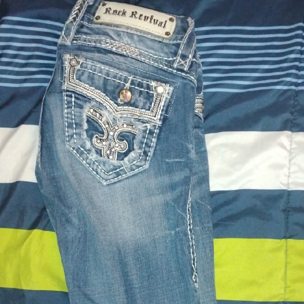 Rock Revival Distressed Blue Jeans with Embellished Pockets